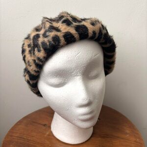 Black and tan leopard print fuzzy faux fur beret